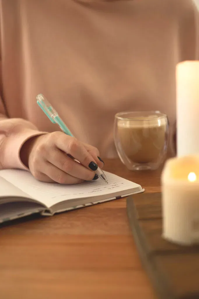 A quiet journaling moment in warm evening light